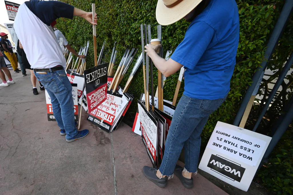 Hollywood actors and writers along with their supporters walk the picket line outside of Disney studios in Burbank, Calif., on July 18, 2023. (Robyn Beck/AFP via Getty Images)