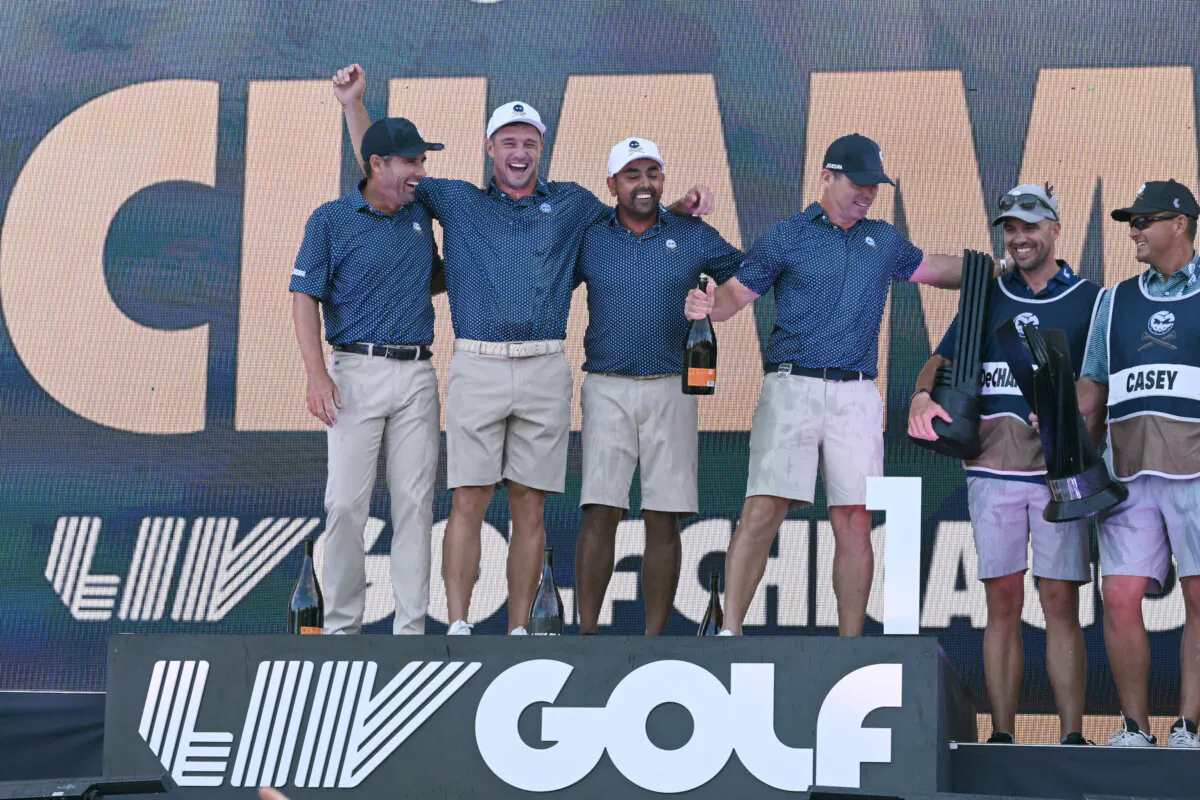 Bryson DeChambeau, Anirban Lahiri, Charles Howell III, and Paul Casey celebrate after the LIV Golf Invitational–Chicago at Rich Harvest Farms in Sugar Grove, Ill., on Sept. 24, 2023 (Quinn Harris/Getty Images)