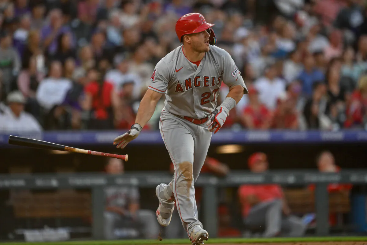 Mike Trout (27) of the Los Angeles Angels watches the flight of a third inning solo homerun in a game against the Colorado Rockies at Coors Field in Denver on June 24, 2023. (Dustin Bradford/Getty Images)
