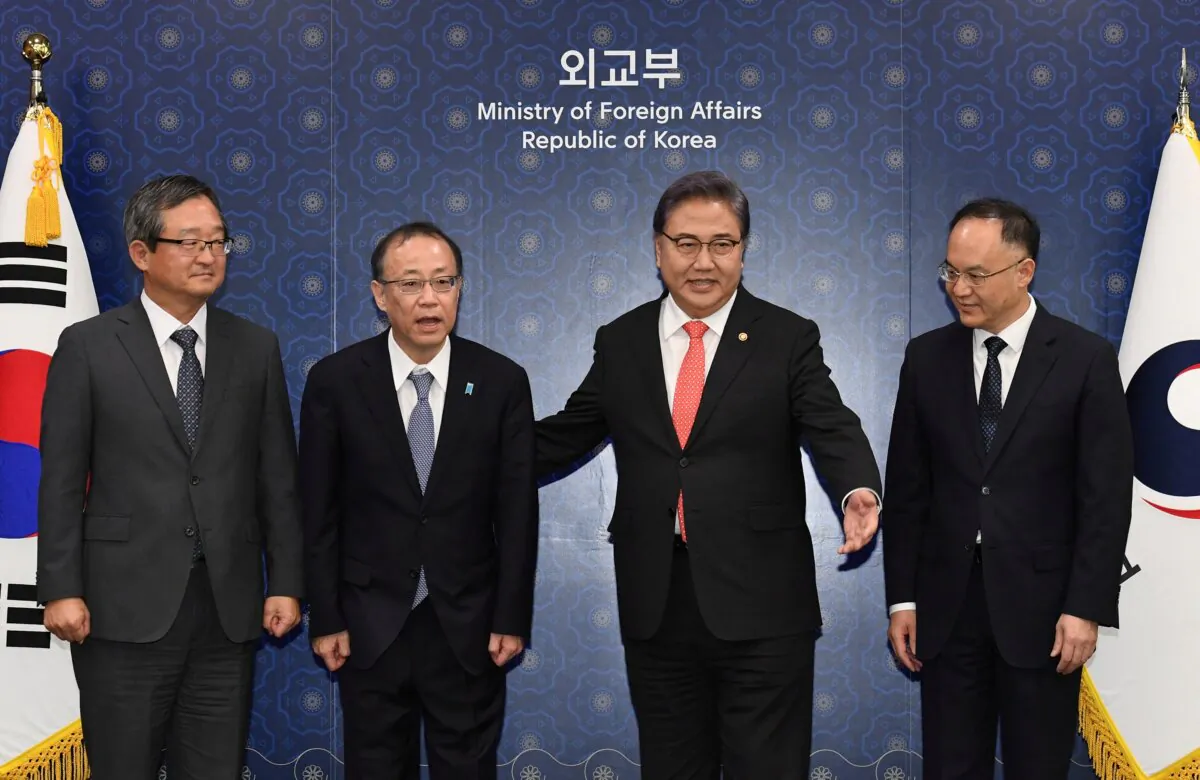 South Korean Foreign Minister Park Jin welcomes Senior Deputy Minister for Foreign Affairs of Japan Takehiro Funakoshi, Assistant Minister of Foreign Affairs of China Nong Rong and Deputy Minister for Political Affairs of the South Korean foreign ministry Jung Byung-won before their meeting ahead of South Korea, China, and Japan trilateral meeting at the foreign ministry in Seoul, South Korea, on Sept. 25, 2023. (Kim Min-Hee/Pool via Reuters)