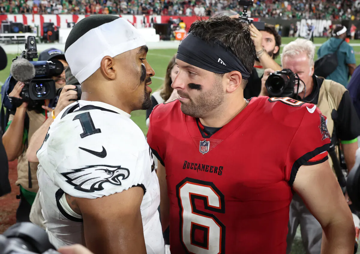Jalen Hurts #1 of the Philadelphia Eagles and Baker Mayfield (6) of the Tampa Bay Buccaneers talk after their game at Raymond James Stadium in Tampa on Sept. 25, 2023. ( Mike Carlson/Getty Images)