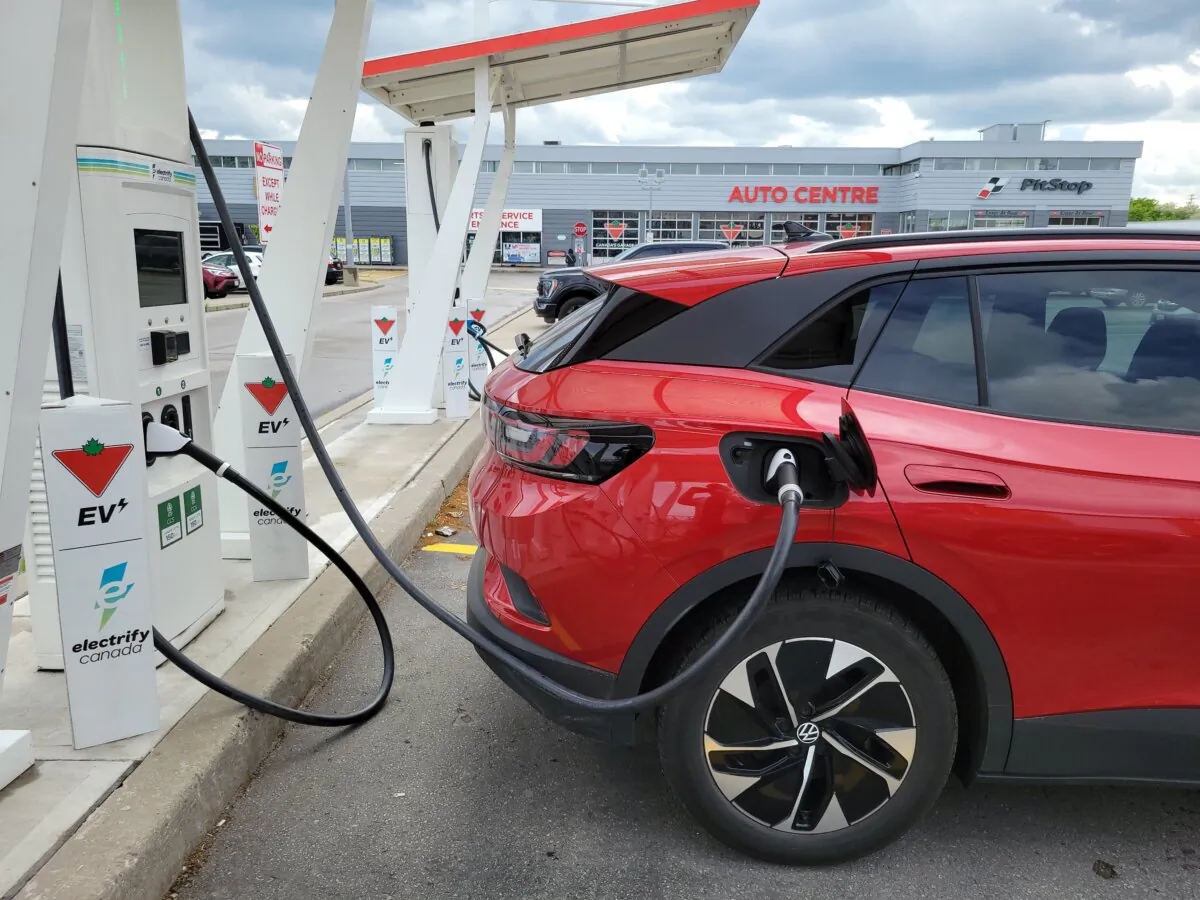 An electric car at a charging station in Toronto on June 14, 2023. (The Canadian Press/Doug Ives)
