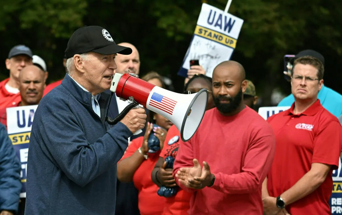 President Joe Biden addresses a United Automobile Workers (UAW) picket line at a General Motors Service Parts Operations plant in Belleville, Mich., on Sept. 26, 2023. (Jim Watson/AFP via Getty Images)