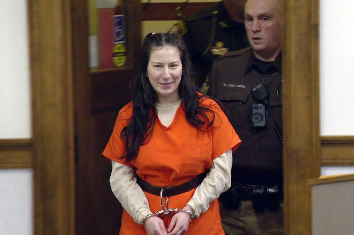 Taylor Schabusiness returns to a Brown County courtroom after attacking her attorney Quinn Jolly during a hearing in Green Bay, Wis., on Feb. 14, 2023. (WLUK/Tim Flanigan via AP)