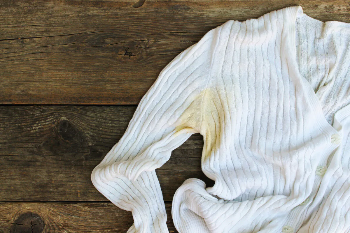 Armpit stains on white T-shirts are caused by the reaction between antiperspirant ingredients and the salts in human sweat. (Victoria 1/Shutterstock)