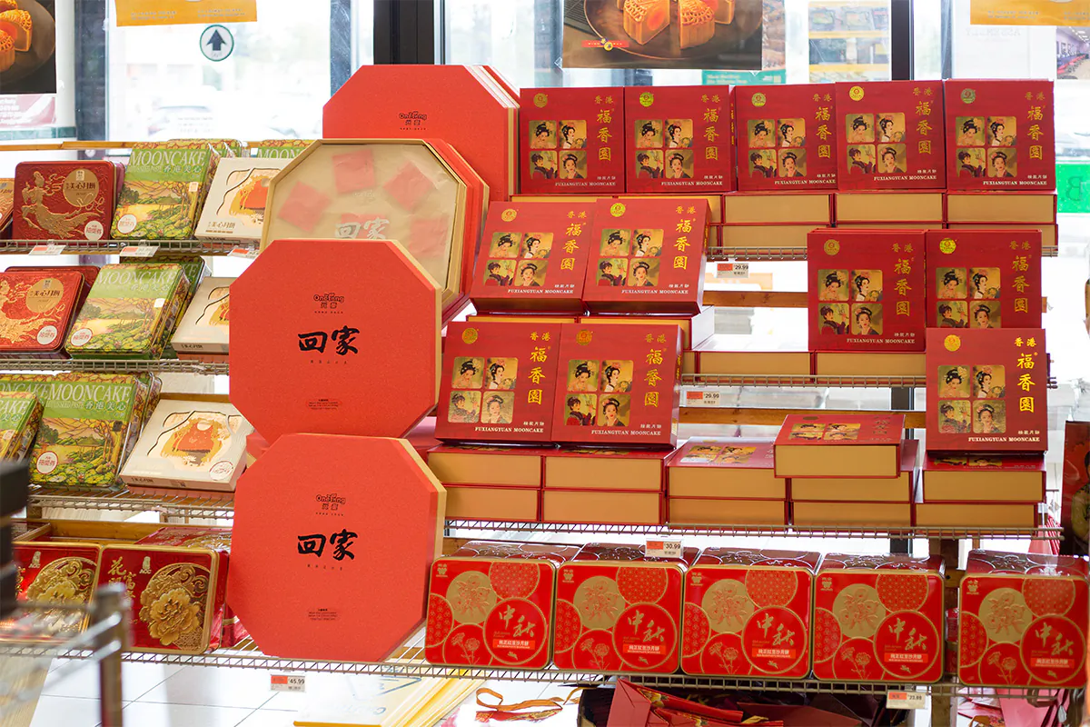 Mooncakes on the shelves in Kam Man Food supermarket in New Jersey, USA, on Sept. 19, 2018. (Helen89/Shutterstock)