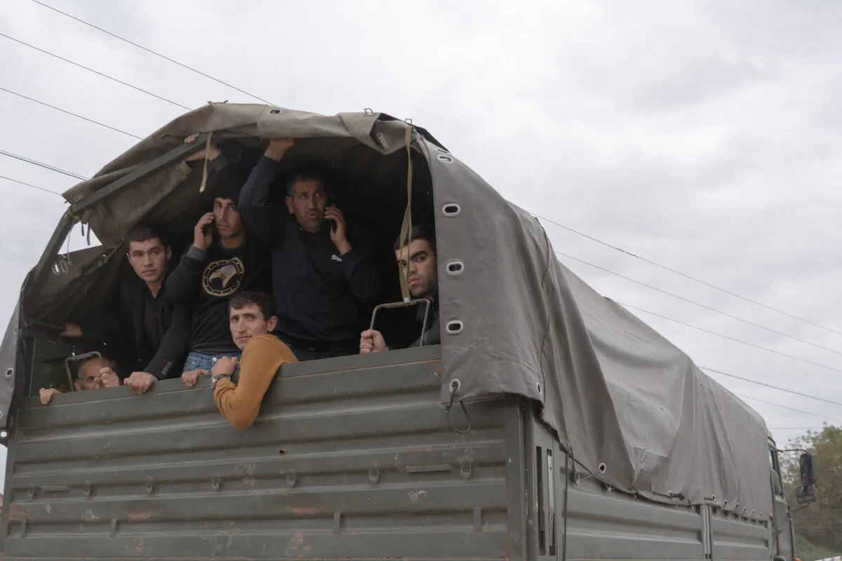 Armenians from Nagorno-Karabakh are evacuated in Kornidzor, Armenia, on Sept. 26, 2023. Some 30,000 Armenians have fled Nagorno-Karabakh in the past week after the defeat of Armenian separatist forces against Azerbaijan. (Astrig Agopian/Getty Images)