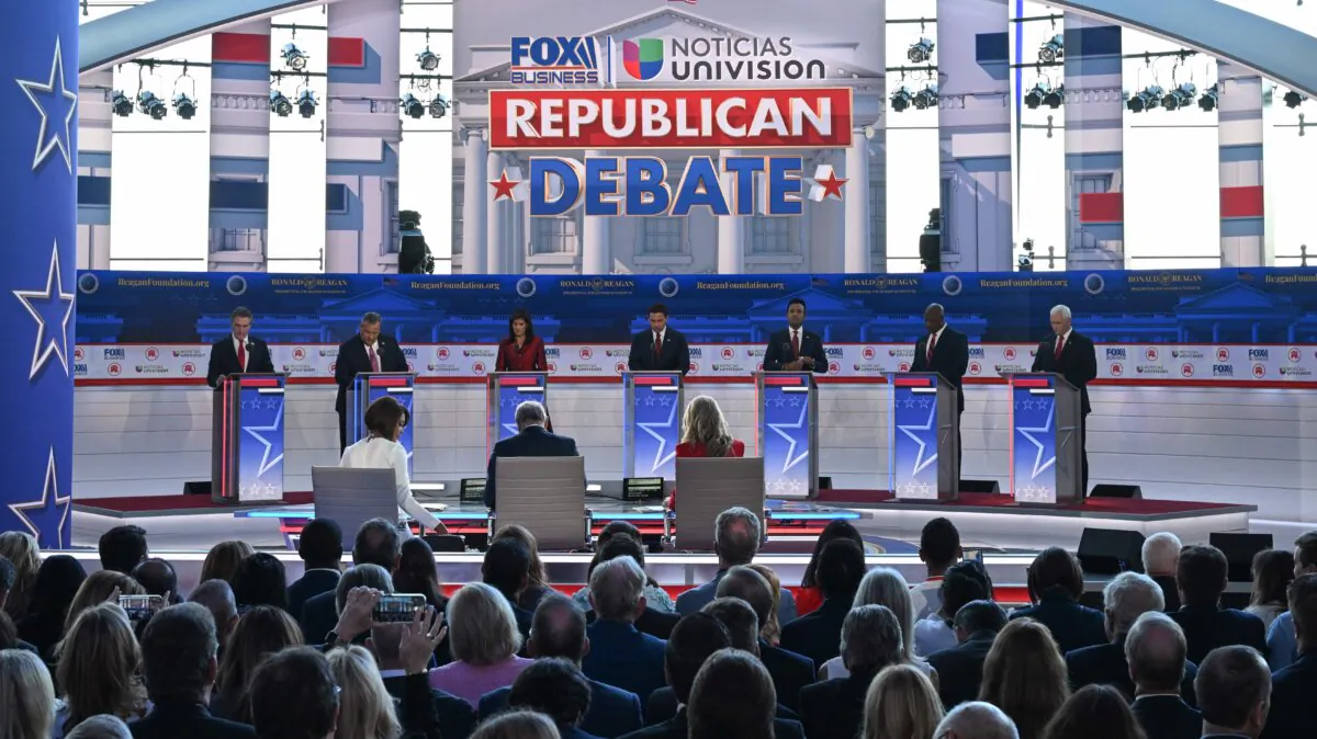 (L–R) North Dakota Gov. Doug Burgum, former New Jersey Gov. Chris Christie, former South Carolina Gov. and U.N. ambassador Nikki Haley, Florida Gov. Ron DeSantis, entrepreneur Vivek Ramaswamy, South Carolina Sen. Tim Scott, and former Vice President Mike Pence at the second Republican presidential primary debate at the Ronald Reagan Presidential Library in Simi Valley, Calif., on Sept. 27, 2023. (Robyn Beck/AFP via Getty Images)