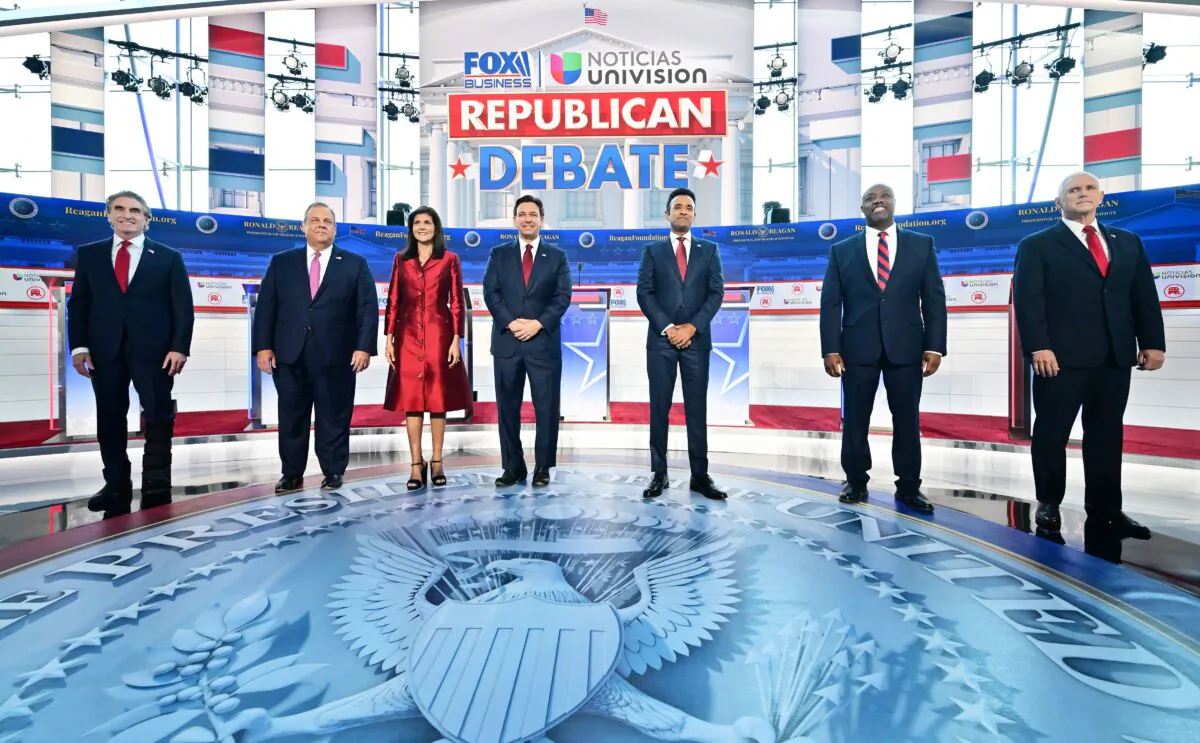 (L–R) North Dakota Gov. Doug Burgum, former New Jersey Gov. Chris Christie, former South Carolina Gov. and U.N. ambassador Nikki Haley, Florida Gov. Ron DeSantis, entrepreneur Vivek Ramaswamy, Sen. Tim Scott (R-S.C.), and former Vice President Mike Pence attend the second Republican presidential primary debate at the Ronald Reagan Presidential Library in Simi Valley, Calif., on Sept. 27, 2023. (Frederic J. Brown/AFP via Getty Images)