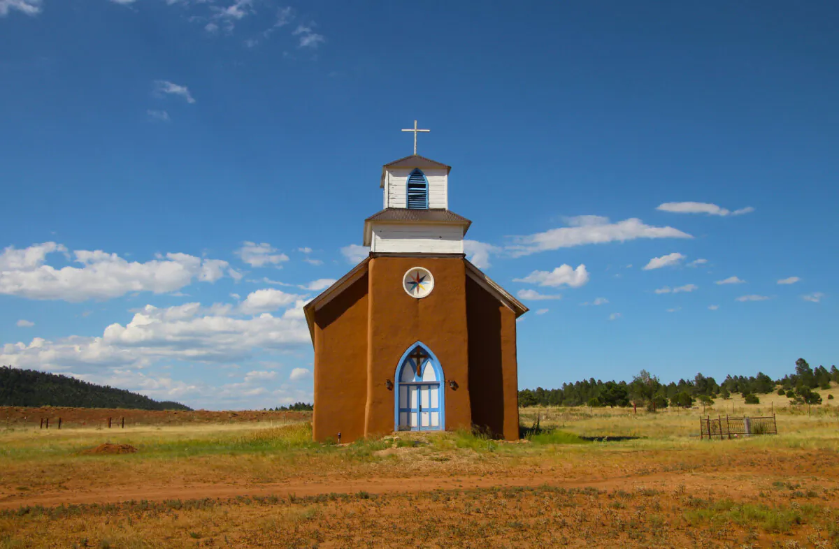 A drive around the countryside near Las Vegas, New Mexico, produces plenty of photo ops, with tiny churches, old mills, and hilly landscapes created by the Sangre de Cristo Mountains. The tradition of blue doors is a common theme in New Mexico. (Mary Ann Anderson/TNS)