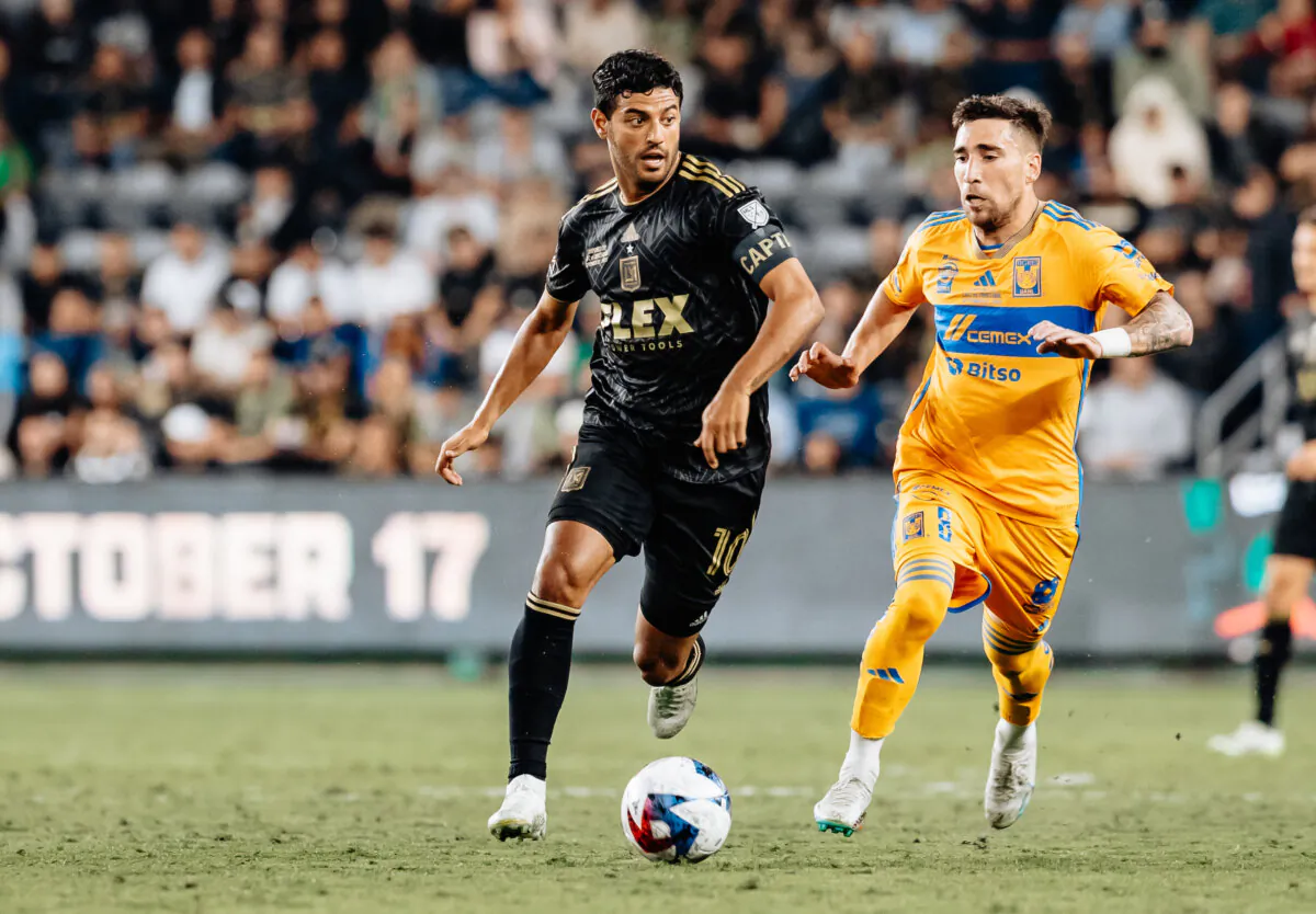Los Angeles FC forward Carlos Vela (10) dribbles the ball against Tigres UANL midfielder Fernando Gorriaran (8) at BMO Stadium in Los Angeles on Sept. 27, 2023. (Courtesy of LAFC via The Epoch Times)
