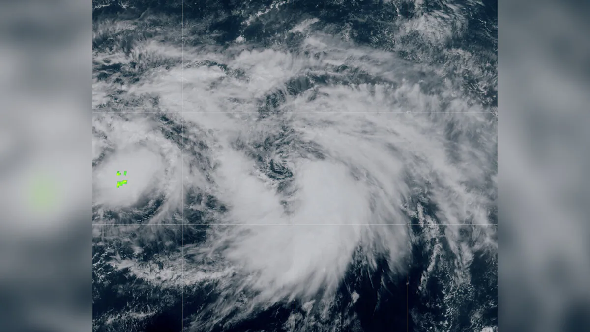This satellite image provided on 11:11 am EST shows Tropical Storm Rina forming in the Atlantic Ocean on Sept. 28, 2023. (NOAA via AP)