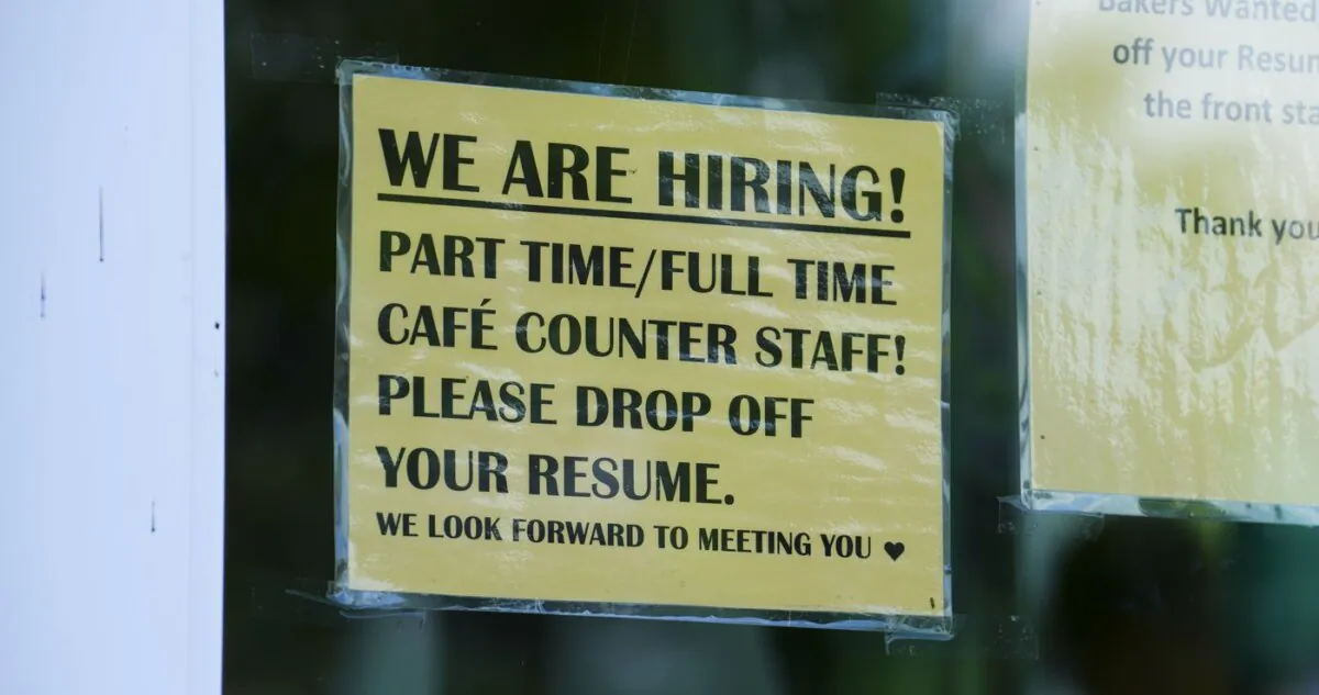 A "help wanted" sign is pictured in a restaurant window in Ottawa on July 12, 2022. (The Canadian Press/Sean Kilpatrick)