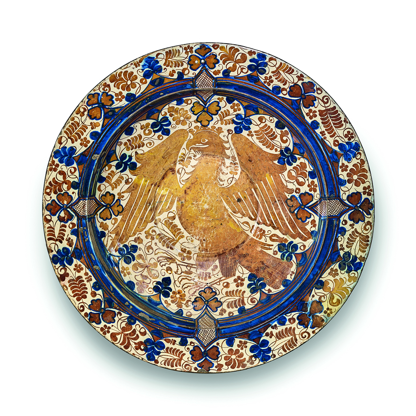 A Large Hispano-Moresque Earthenware Blue and Lustred Charger