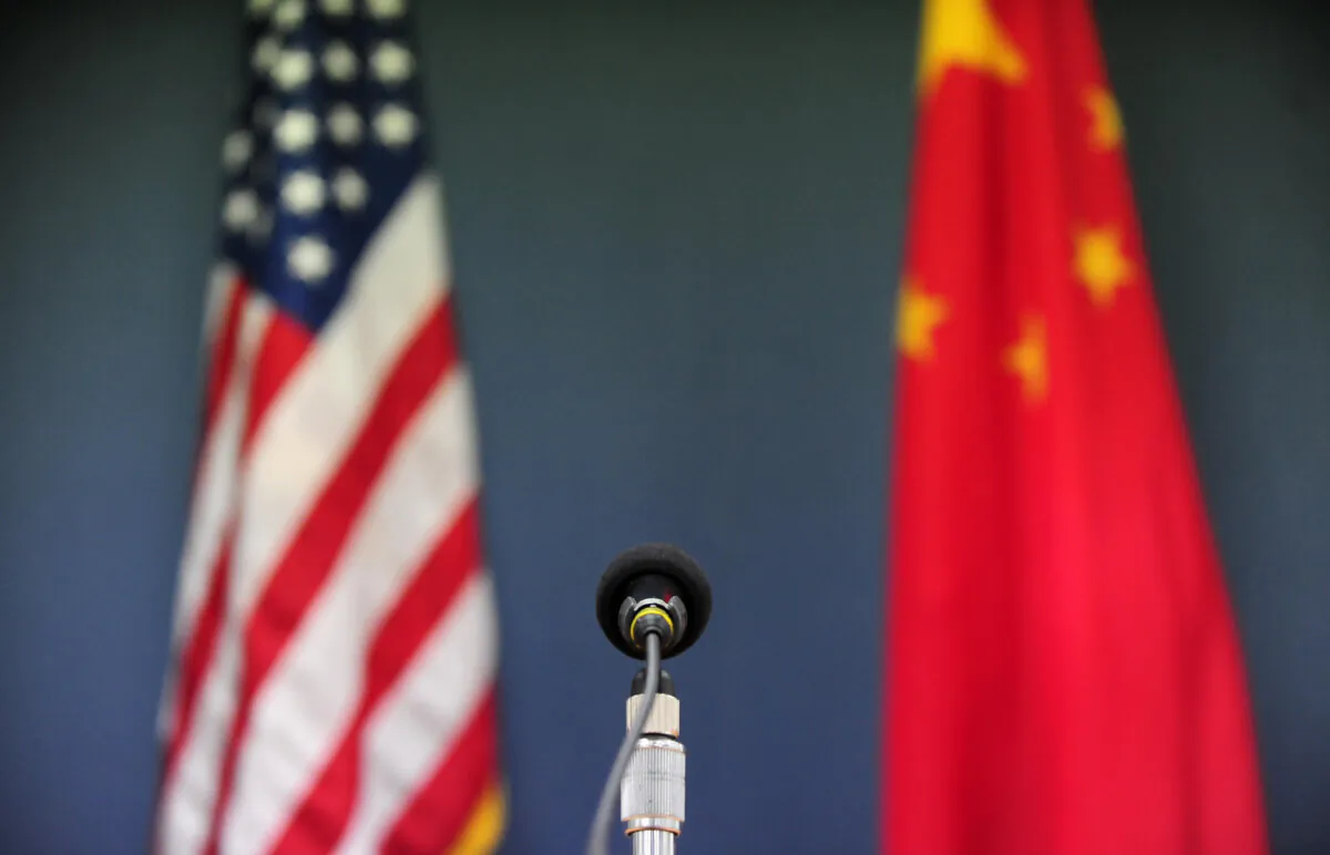 U.S. and China flags. (Frederic J. Brown/AFP via Getty Images)