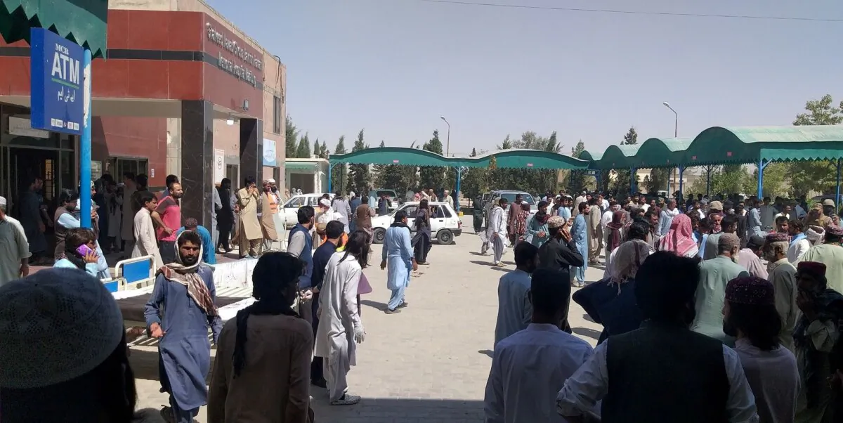 People gather outside the Mastung hospital, following a deadly suicide attack on a religious gathering in Balochistan Province, Pakistan, on Sept. 29, 2023. (Shaheed Nawab Ghous Bakhsh Raisani Memorial Hospital Mastung/Handout via Reuters)