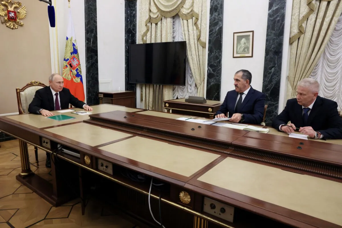 Russian President Vladimir Putin meets with senior former commander of the Wagner mercenary group Andrei Troshev and Deputy Defence Minister Yunus-Bek Yevkurov in Moscow, Russia, on Sept. 28, 2023. (Mikhail Metzel/Sputnik/Pool via Reuters)