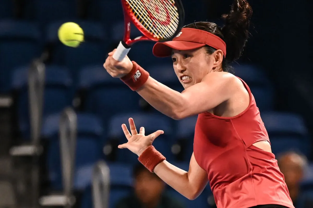 Misaki Doi of Japan hits a return against Petra Martic of Croatia during their women's singles match on day two of the Pan Pacific Open tennis tournament in Tokyo on Sept.26, 2023. (Richard A. Brooks/AFP via Getty Images)