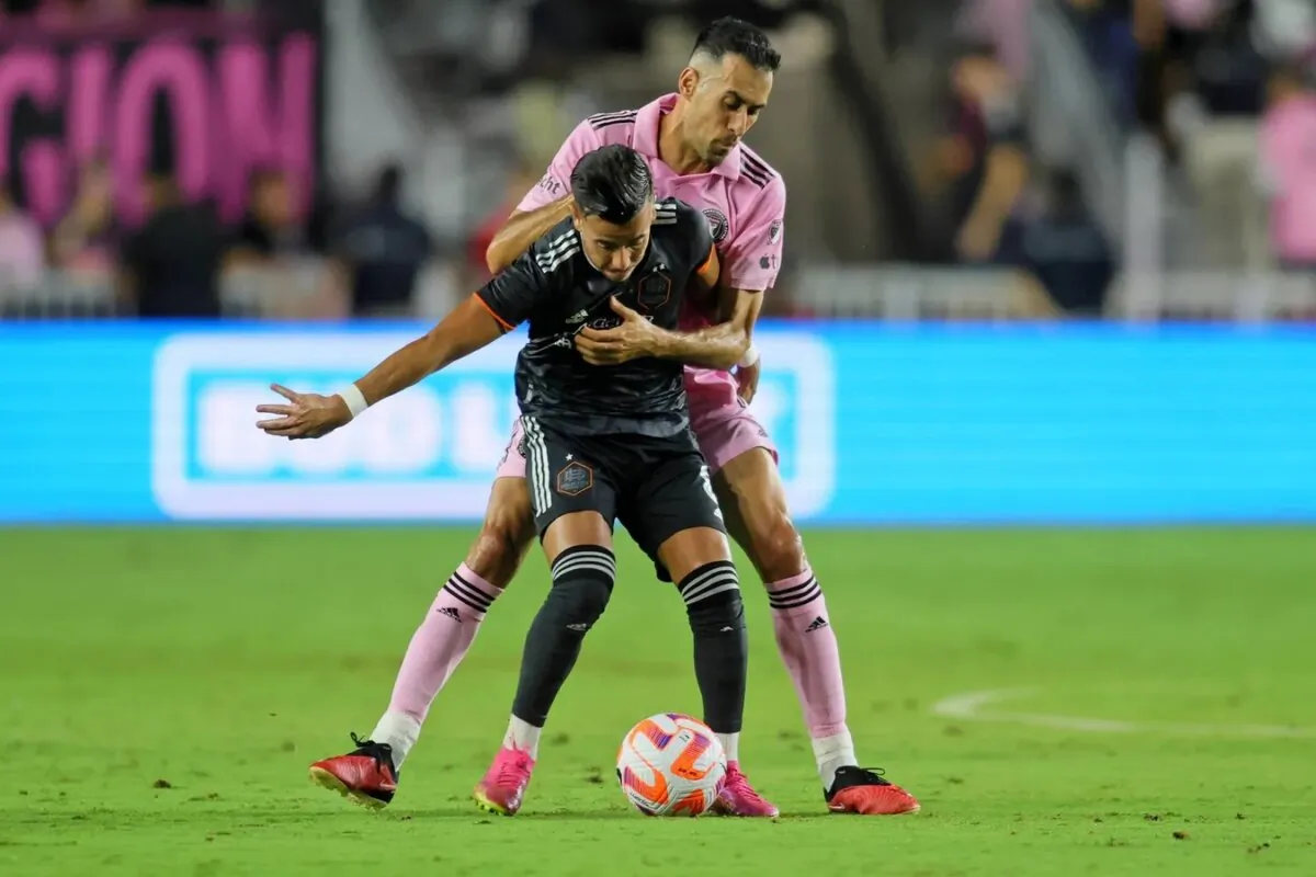 Houston Dynamo midfielder Amine Bassi (8) battles for the ball against Inter Miami CF midfielder Sergio Busquets (5) during the first half at DRV PNK Stadium Fort Lauderdale, Fla., on Sept. 27, 2023. (Sam Navarro/USA TODAY Sports via Field Level Media)