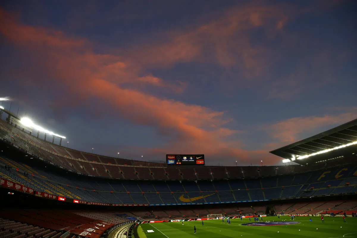 The Camp Nou stadium as the sun sets ahead of the Spanish La Liga soccer match between FC Barcelona and Valladolid CF in Barcelona, Spain, on April 5, 2021. (Joan Monfort/AP Photo)