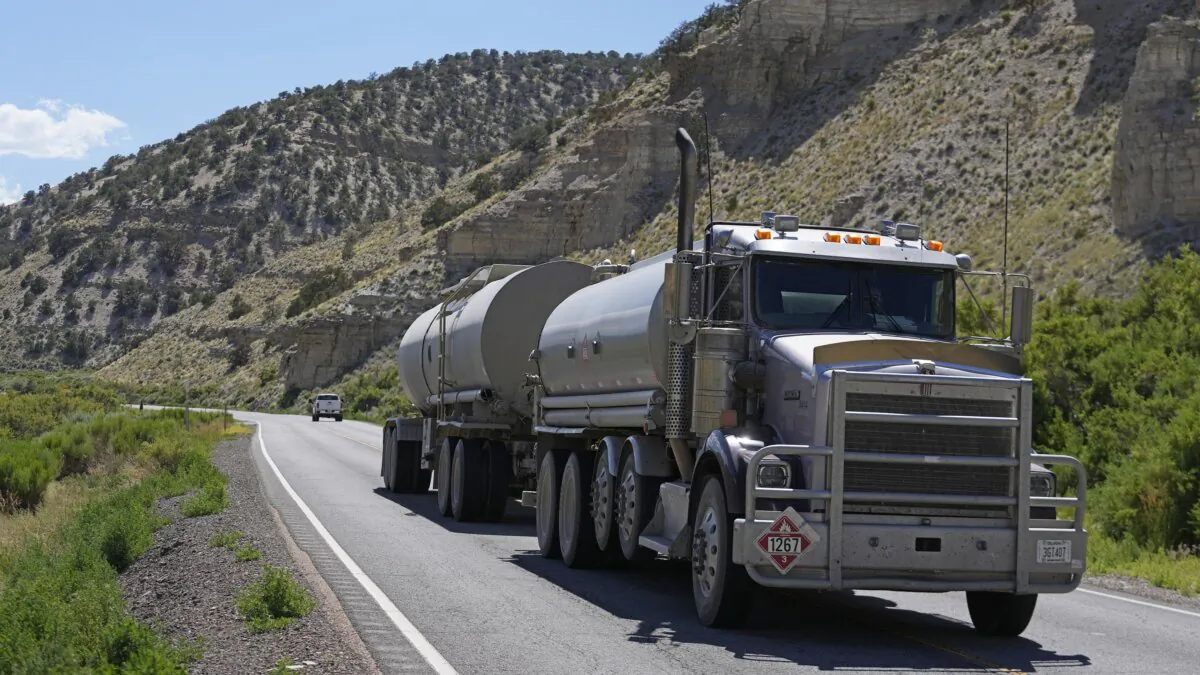 A tanker truck transports oil through the Uintah Basin south of Duchesne, Utah, on July 13, 2023. (Rick Bowmer/AP Photo)