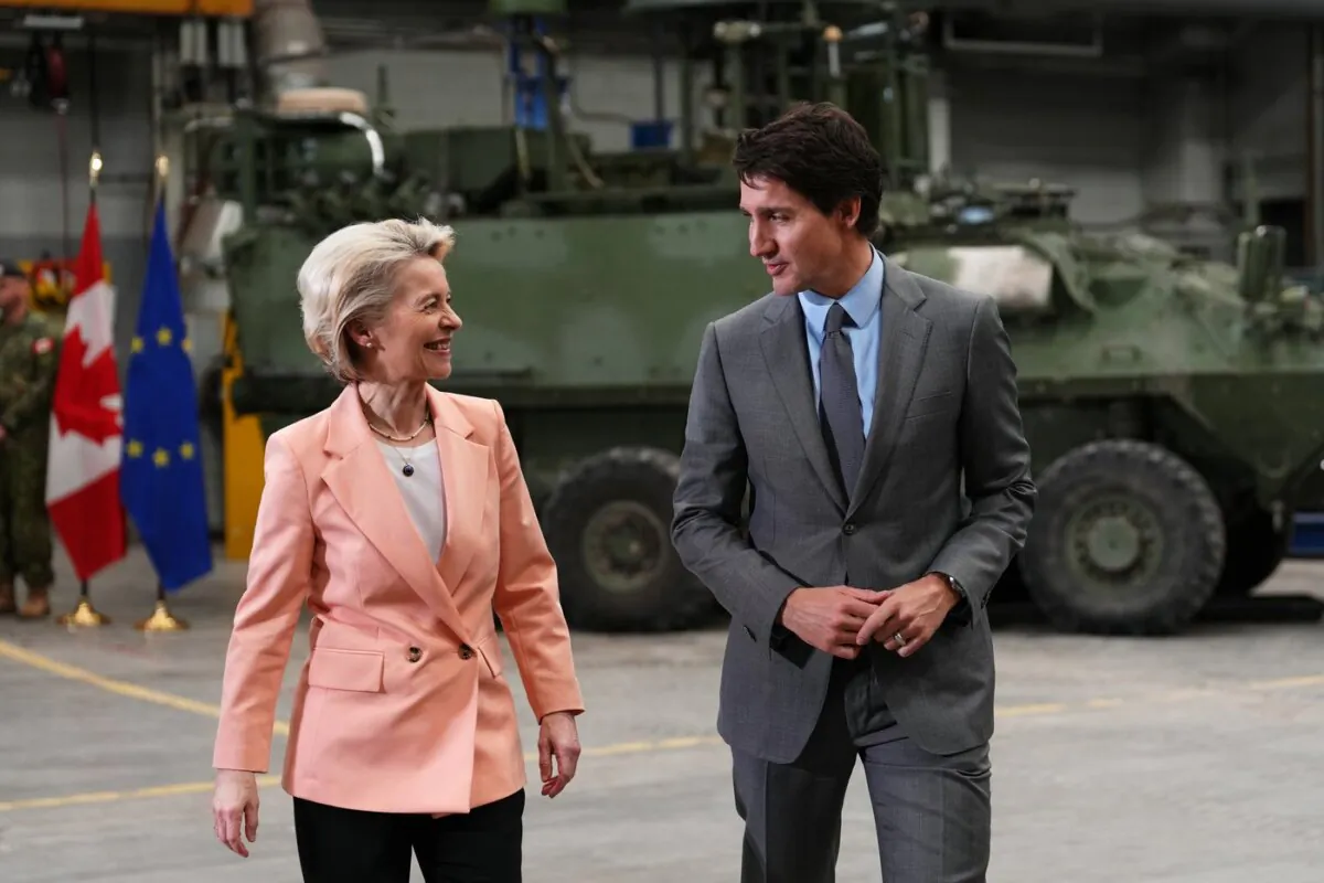 Prime Minister Justin Trudeau and European Commission President Ursula von der Leyen chat during a visit at CFB Kingston in Kingston, Ont., on Mar. 7, 2023. (The Canadian Press/Sean Kilpatrick)