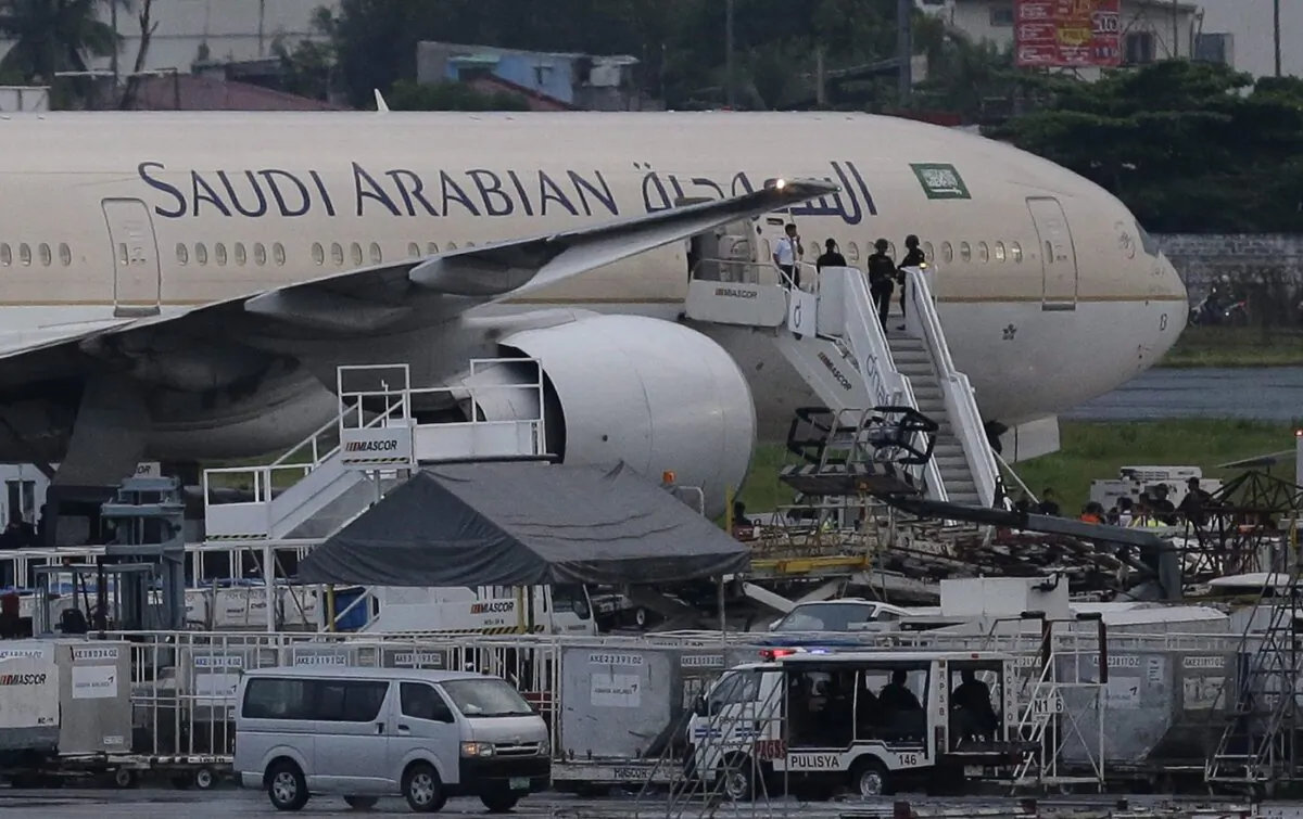 A Saudi Arabian Airlines plane is shown at Manila's International Airport in Pasay, Philippines on Sept. 20, 2016. (The Canadian Press/AP-Aaron Favila)