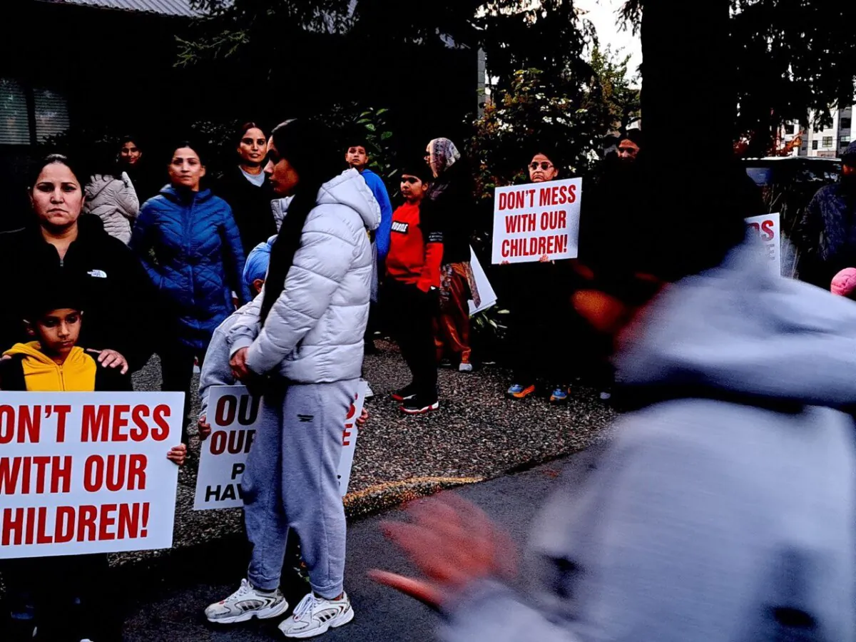 People gather to protest against the SOGI (Sexual Orientation and Gender Identity) in schools, in Abbotsford, B.C., on Sept. 28, 2023. (Jeff Sandes/The Epoch Times)