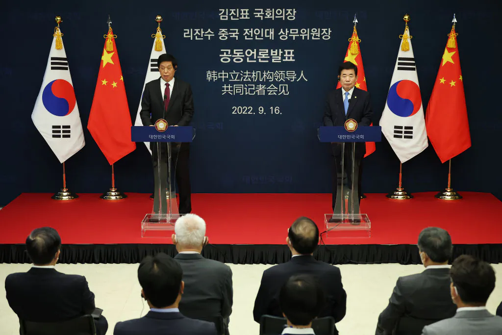 China's National People's Congress (NPC) Standing Committee Chairman Li Zhanshu (L) attends with South Korea's National Assembly Speaker Kim Jin-pyo (R) during a joint news conference with South Korea's National Assembly Speaker Kim Jin-pyo at the National Assembly in Seoul, South Korea, on Sept.16, 2022. (Kim Hong-Ji - Pool/Getty Images)