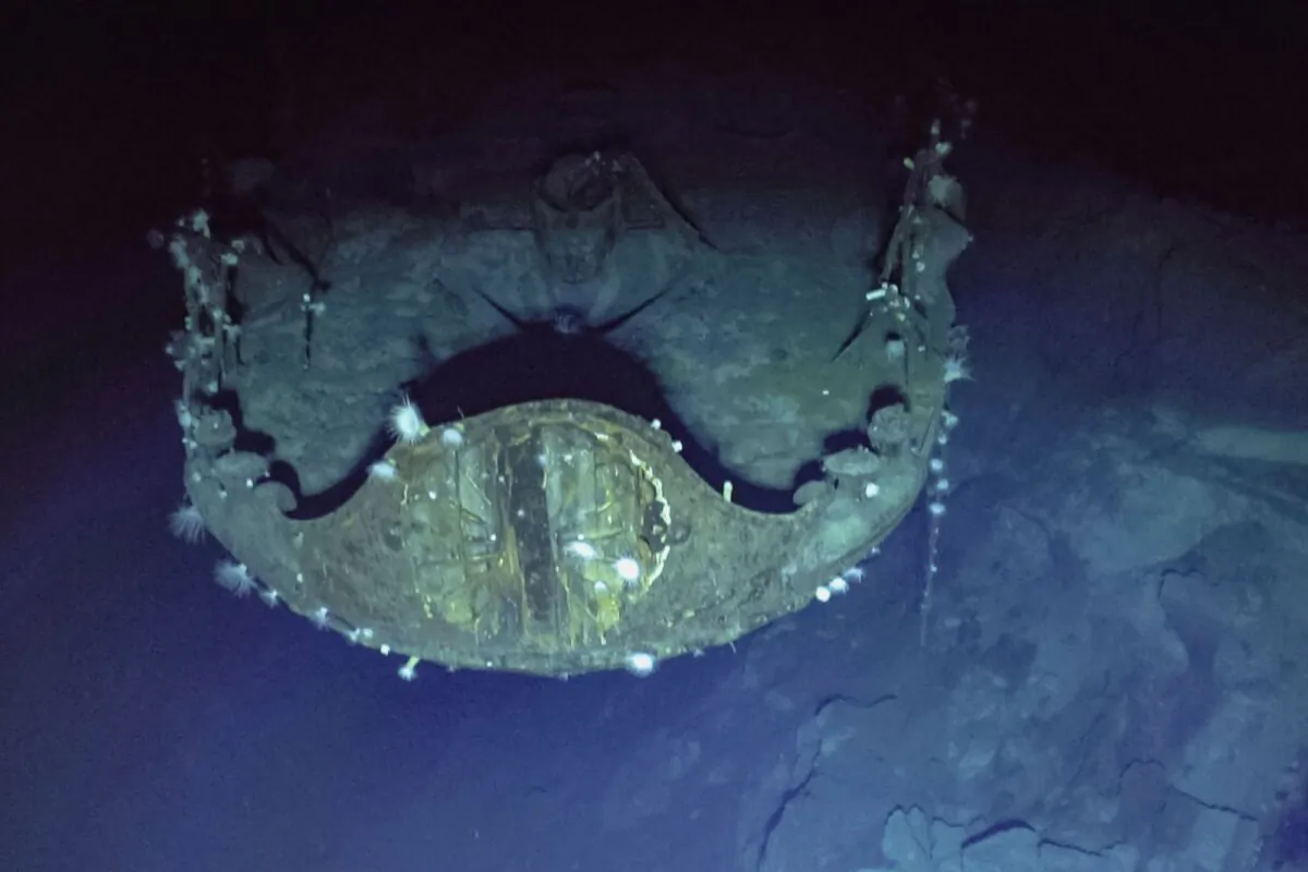 The chrysanthemum flower crest, an honored imperial symbol of Japan, can still be seen prominently on the bow of aircraft carrier Akagi 81 years after the aircraft carrier's sinking on Sept. 10, 2023. (Ocean Exploration Trust/NOAA via AP)