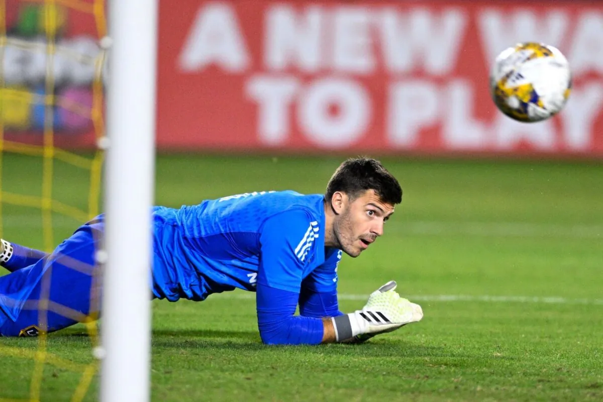 LA Galaxy goalkeeper Jonathan Bond (1) watches as Portland Timbers forward Santiago Moreno (30) scores a goal during the first half at Dignity Health Sports Park in Carson, Calif., on Sept. 30, 2023. (Kelvin Kuo/USA TODAY Sports via Field Level Media)