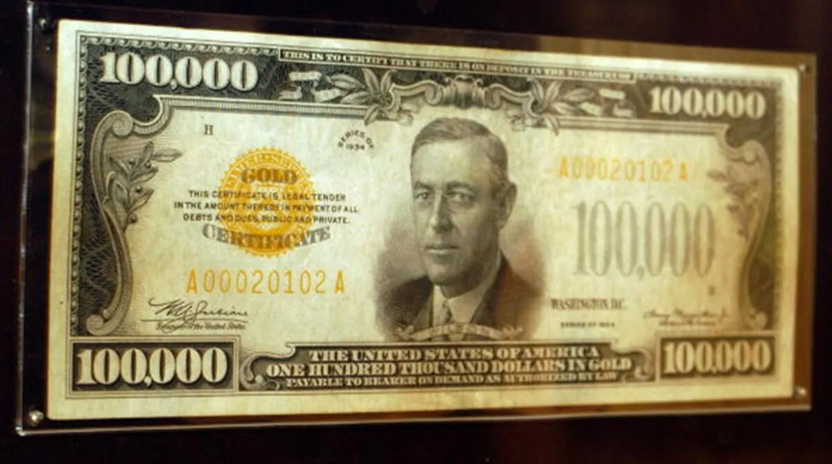 A $100,000 gold certificate on display at the Philadelphia Federal Reserve Bank in 2003. (William Thomas Cain/Getty Images)