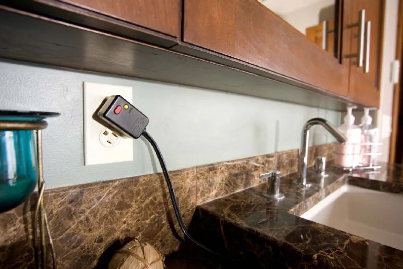 A rotating outlet turns a bulky plug out of the way to make room for another one. (360 Electrical/TNS)