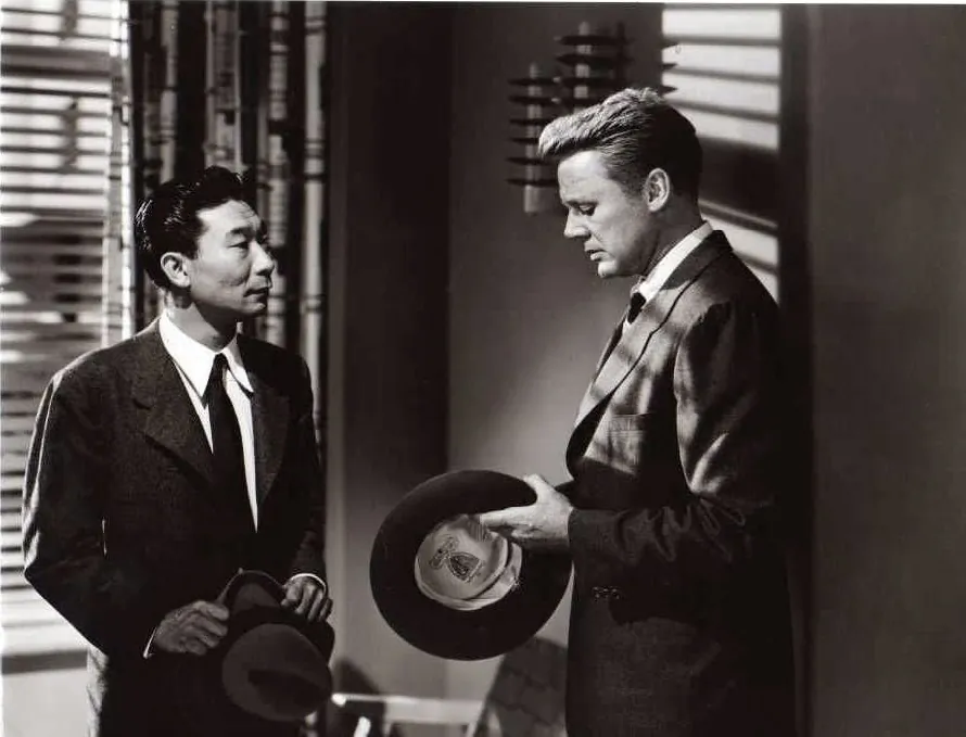 Dr. Lee (Philip Ahn, L) and David Maldon (Van Johnson), in "The Big Hangover." (Warner Bros.)