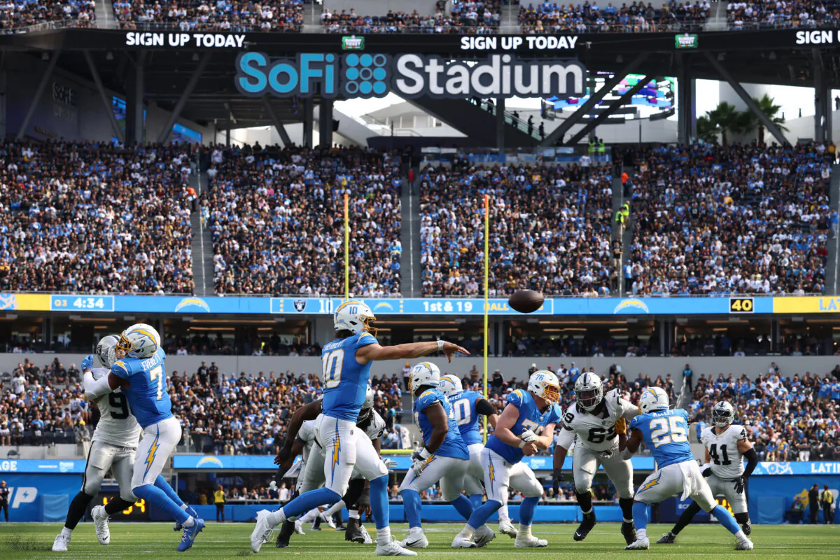 Justin Herbert (10) of the Los Angeles Chargers passes against the Las Vegas Raiders during the thi quarter at SoFi Stadium in Inglewood, Calif., on Oct. 1, 2023. (Katelyn Mulcahy/Getty Images)