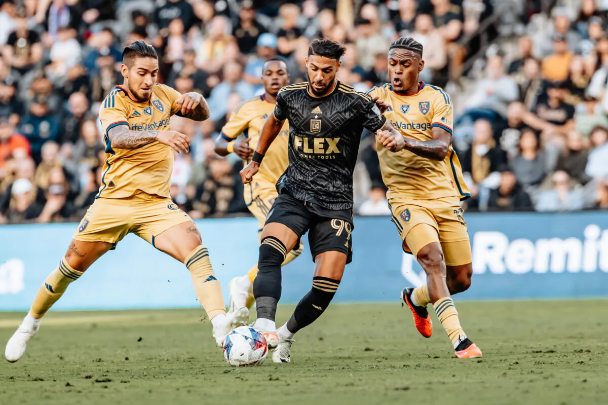 Real Salt Lake forward Cristian Arango (9) battles for the ball against Los Angeles FC forward Denis Bouanga (99) at BMO Stadium in Los Angeles on Oct. 1, 2023. (Courtesy of LAFC via The Epoch Times)