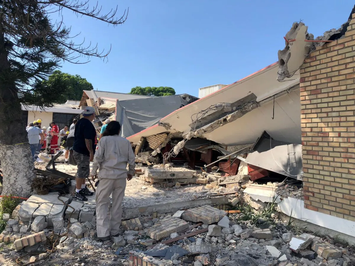Members of a rescue team and people work at a site where a church roof collapsed during Sunday mass in Ciudad Madero, in Tamaulipas state, Mexico in this picture distributed to Reuters on Oct. 1, 2023. (Secretaria de Seguridad Publica Tamaulipas/Handout via Reuters)