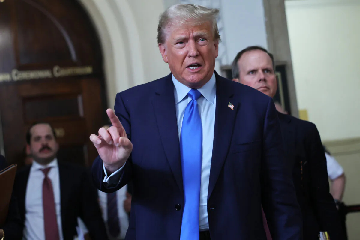Former President Donald Trump speaks to the media after exiting the courtroom for a lunch recess during the first day of his civil fraud trial at New York State Supreme Court in New York on Oct. 2, 2023. (Michael M. Santiago/Getty Images)