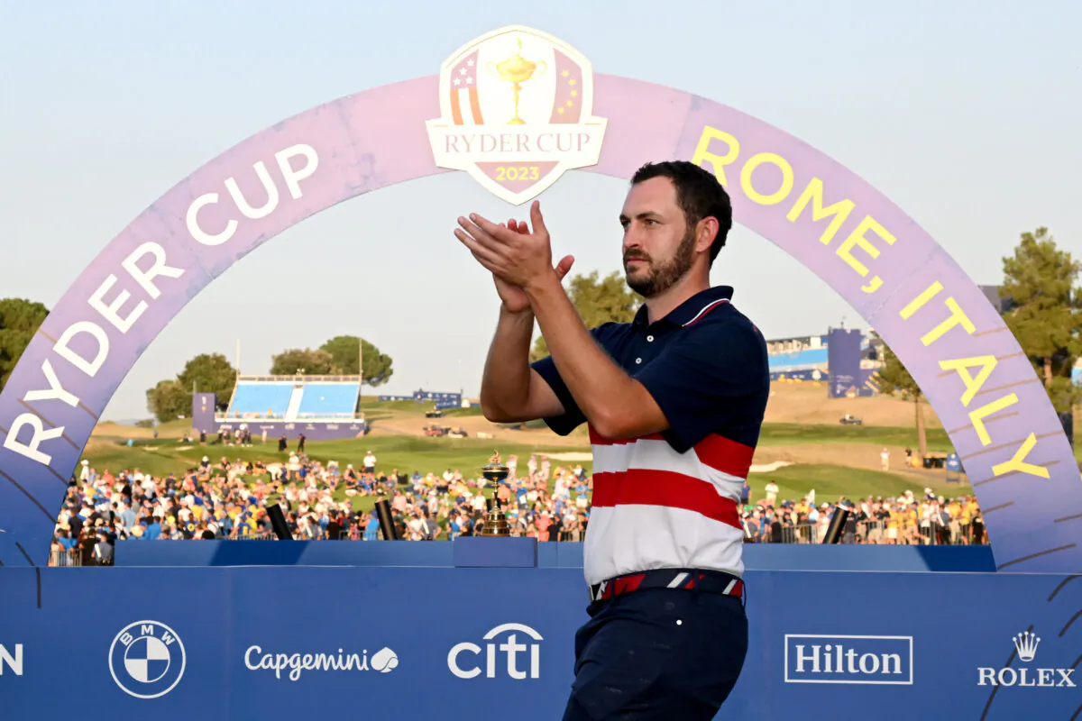 Patrick Cantlay of Team United States acknowledges the crowd on the first hole following the Sunday singles matches of the 2023 Ryder Cup at Marco Simone Golf Club in Rome, Italy, on Oct. 1, 2023. (Ross Kinnaird/Getty Images)
