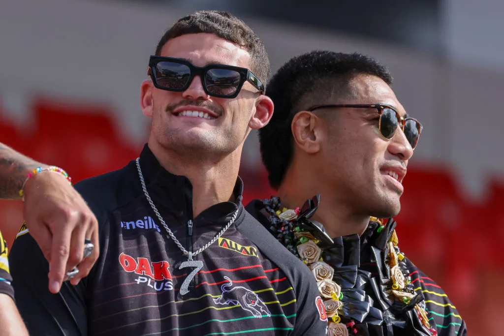 Nathan Cleary of the Panthers (L) and Moses Leota of the Panthers greet fans during the 2023 NRL Grand Final at BlueBet Stadium in Penrith off Sydney, Australia on Oct. 2, 2023. (Jenny Evans/Getty Images)