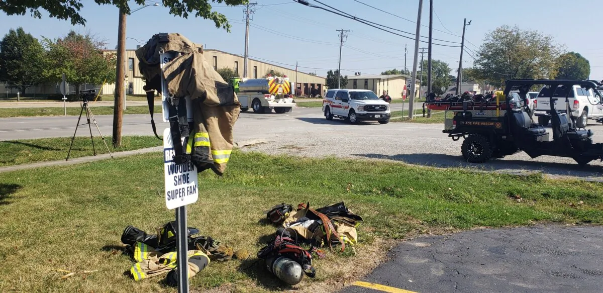 Emergency responders set up a staging area near Teutopolis High School in Teutopolis, Ill., on Sept. 30, 2023. (Jeff Long/Effington Daily News via AP)