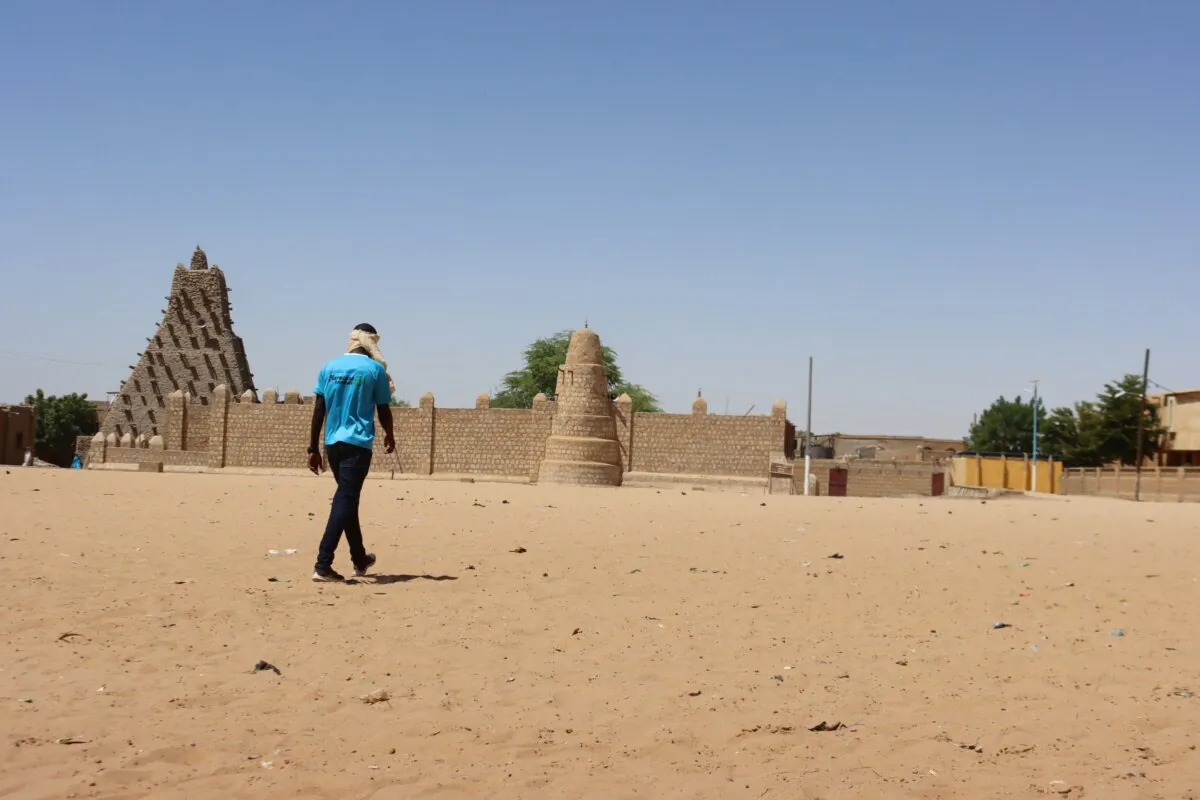 A man walks toward Sankore mosque, also known as the former University of Sankore, in Timbuktu, Mali, on Sept. 25, 2023. (Stringer/Reuters)
