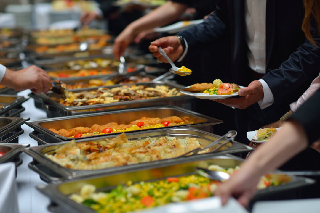 people group catering buffet food indoor in luxury restaurant with meat colorful fruits and vegetables