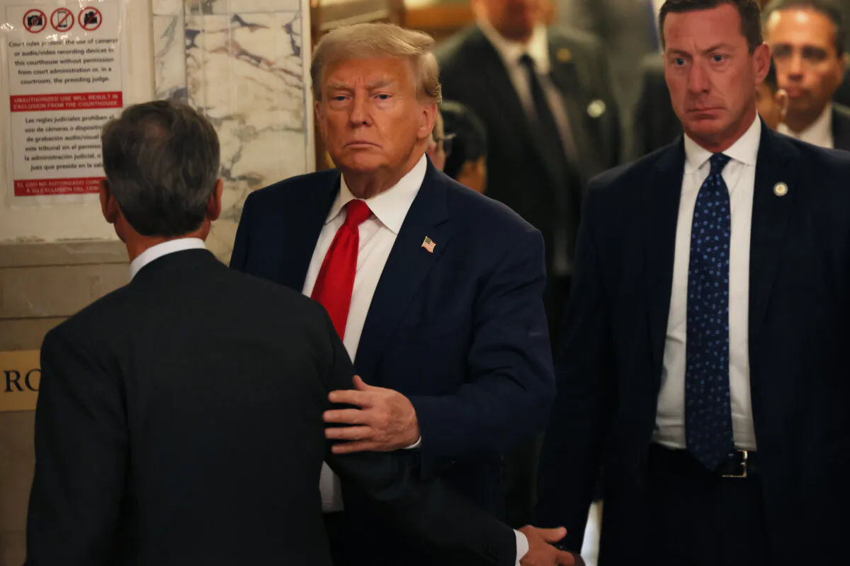 Former President Donald Trump leaves the courtroom for a lunch recess during the second day of his civil fraud trial at New York State Supreme Court in New York on Oct. 3, 2023. (Michael M. Santiago/Getty Images)