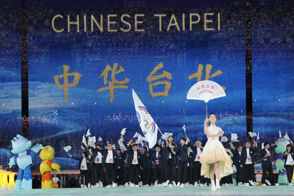 Taiwan's athletes and team officials arrive during the opening ceremony of the 19th Asian Games in Hangzhou, China, on Sept. 23, 2023. (Lee Jin-man/AP Photo)