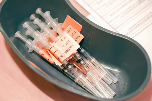 Syringes filled with COVID-19 vaccine sit on a table at a COVID-19 vaccination clinic on April 06, 2022 in San Rafael, California. (Justin Sullivan/Getty Images)
