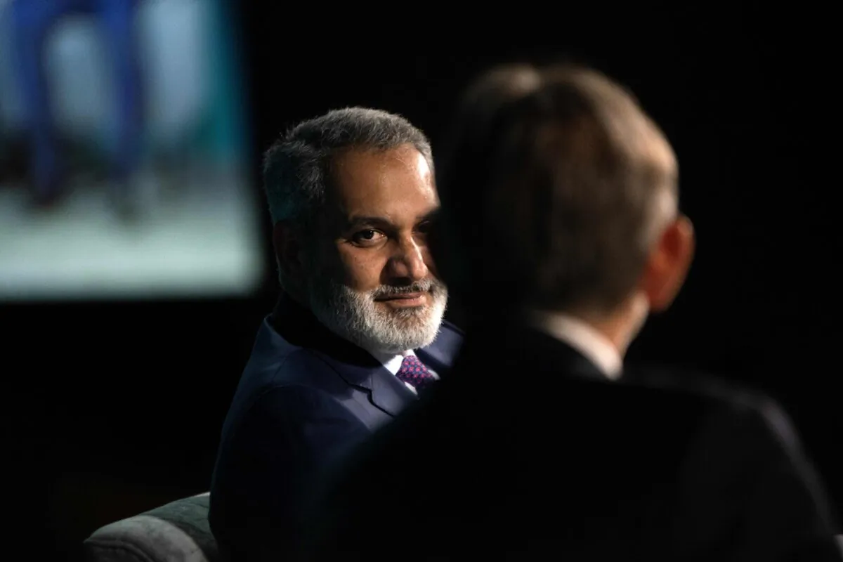 Haitham al-Ghais, Secretary General of OPEC, speaks with Carlos Pascual during CERAWeek by S&P Global in Houston, Texas on March 7, 2023. (Photo by MARK FELIX/AFP via Getty Images)