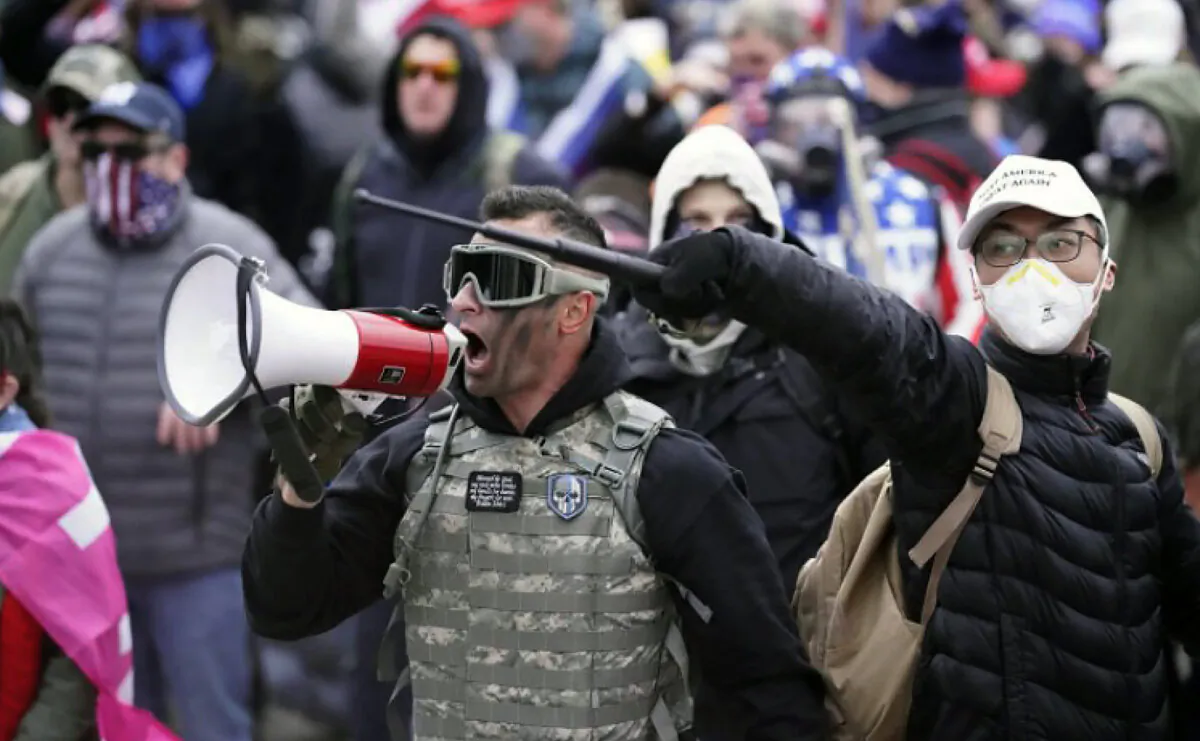 Samuel Lazar, 37, of Ephrata, Pa., berates police on the west plaza of the U.S. Capitol on Jan. 6, 2021. (U.S. Department of Justice/Screenshot via The Epoch Times)
