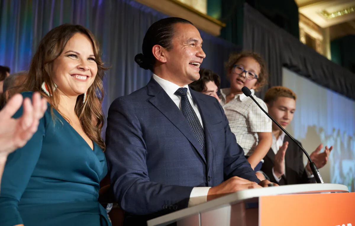 Manitoba NDP leader Wab Kinew delivers his victory speech, alongside his wife Lisa Monkman, after winning the Manitoba Provincial election in Winnipeg on Tuesday, October 3, 2023. THE CANADIAN PRESS/David Lipnowski