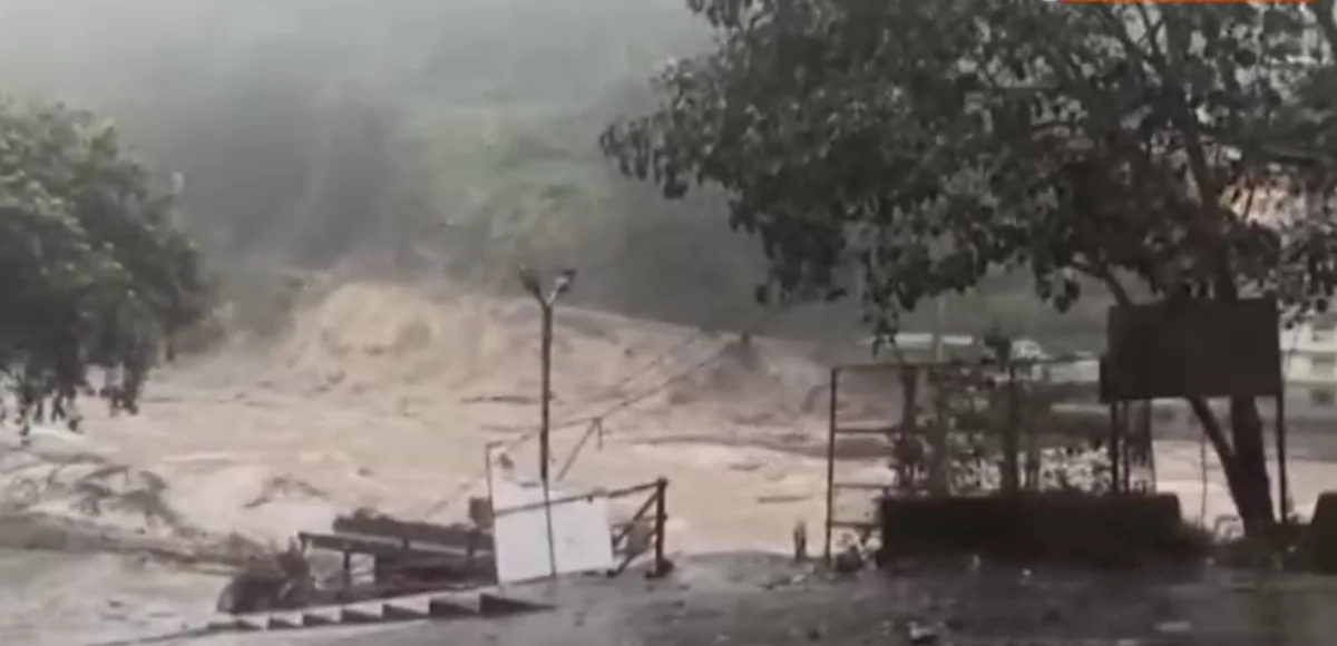 In a still from video,
a swollen Teesta River in Singtam in the northeastern state of Sikkim, India, is shown on Oct. 4, 2023. (ANI via Reuters/Screenshot via The Epoch Times)